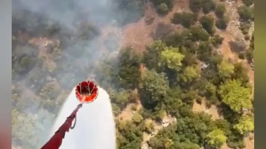 Antalya'da orman yakınında çıkan yangına müdahale ediliyor